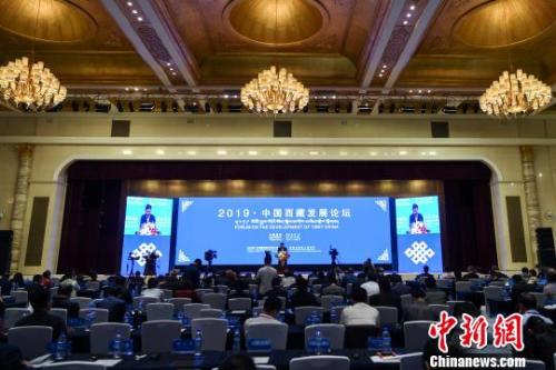 14日晚，由國務院新聞辦公室、西藏自治區(qū)人民政府聯(lián)合主辦的“2019·中國西藏發(fā)展論壇”在拉薩閉幕?！『闻罾?攝