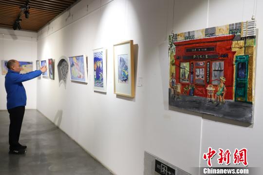 圖為展覽活動現(xiàn)場?！■暮陚?攝
