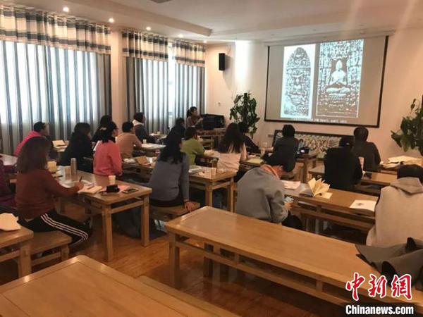 圖為“莫高學(xué)堂”活動(dòng)現(xiàn)場(chǎng)。(資料圖) 敦煌研究院供圖 攝